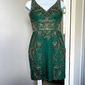 Narianna juniors green dress with mini pearls and green/gold rhinestones.